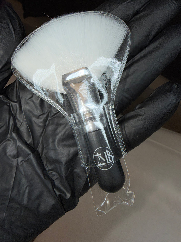 Black facial brush